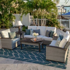 Retreat Outdoor Wicker Swivel Glider In Pebblestone