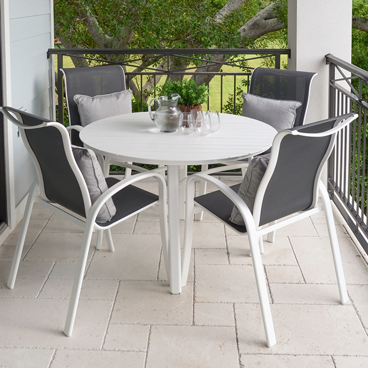 Madeira Outdoor 48" Round Glass Top Dining Table In Textured White - Image 2